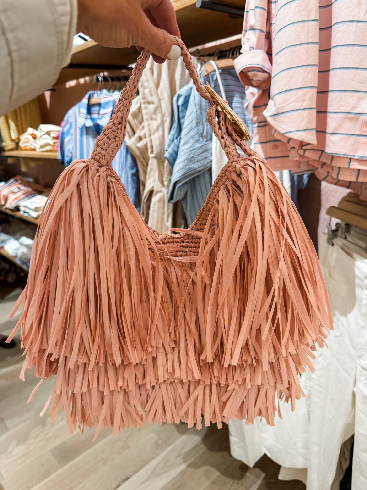 rafia bag with fringe! 10/10 recommend
save with code anthro20