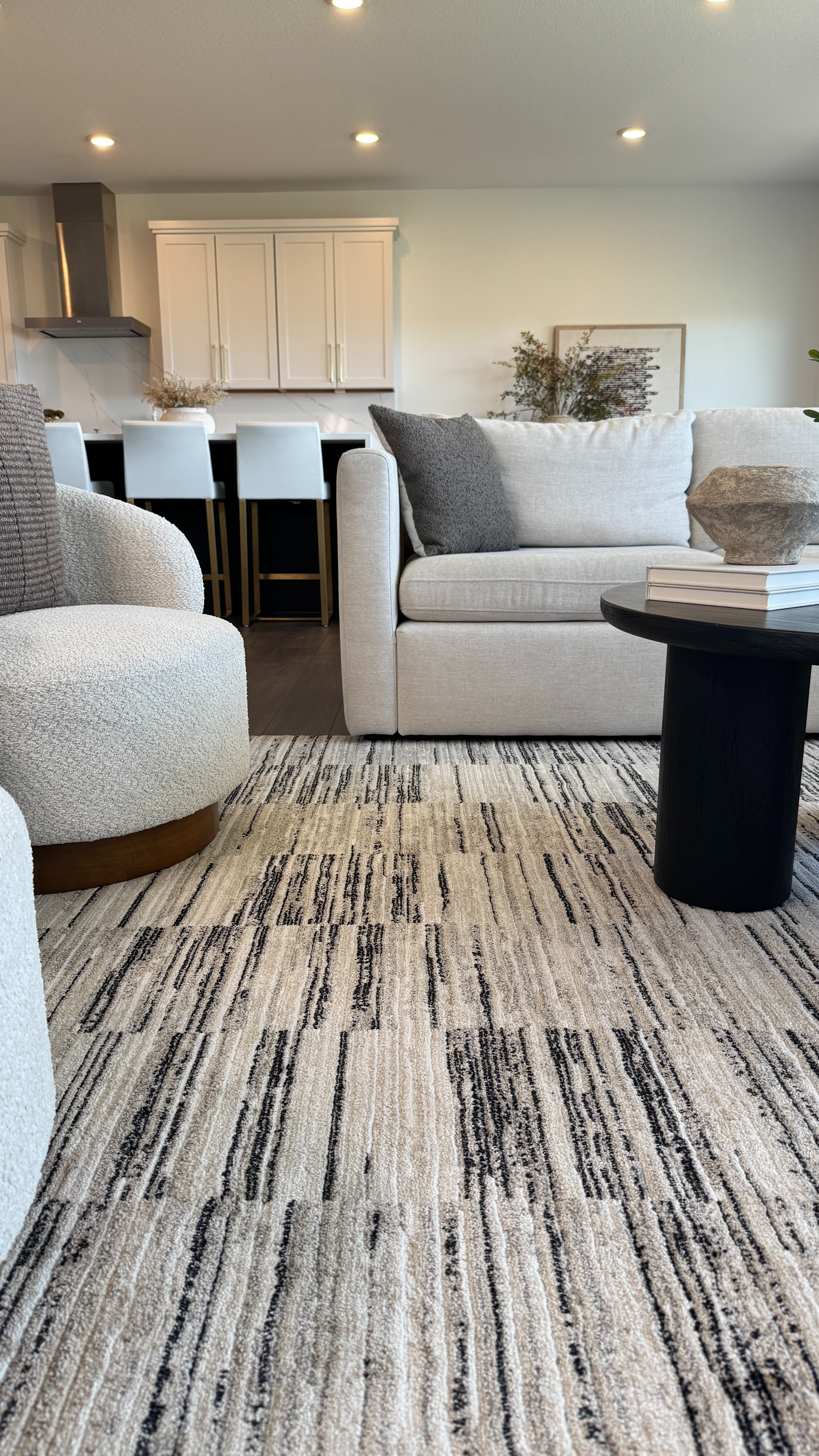 My living room rug is neutral and stunning 🤍 It really anchors the whole space and makes it feel pulled together. 

 #LTKHome