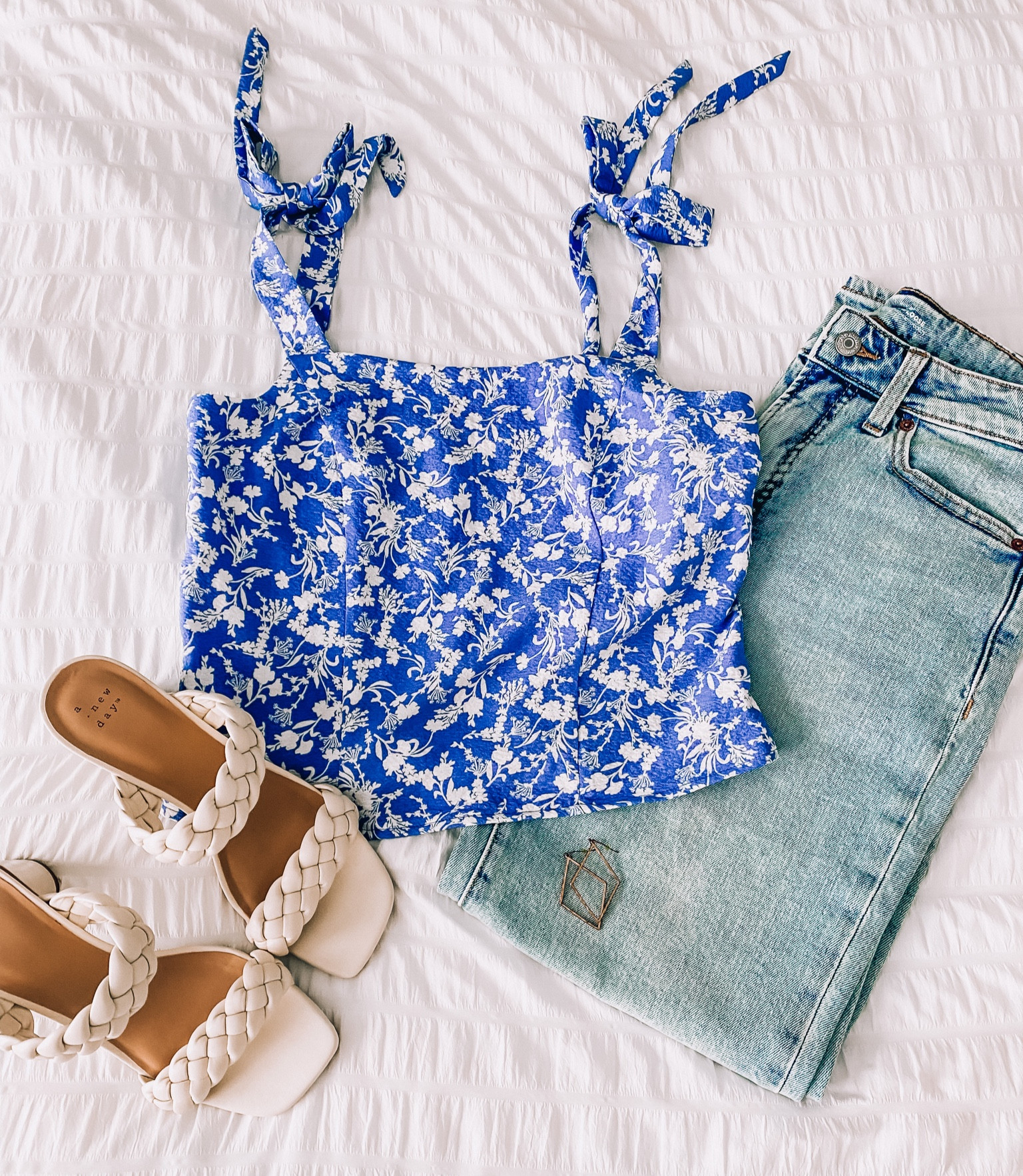 Summer outfit! Floral tank, tie shoulder strap top, wide leg jeans, light wash denim, summer sandal, beach outfit, vacation outfit, date night outfit. 

#LTKtravel #LTKstyletip #LTKunder50