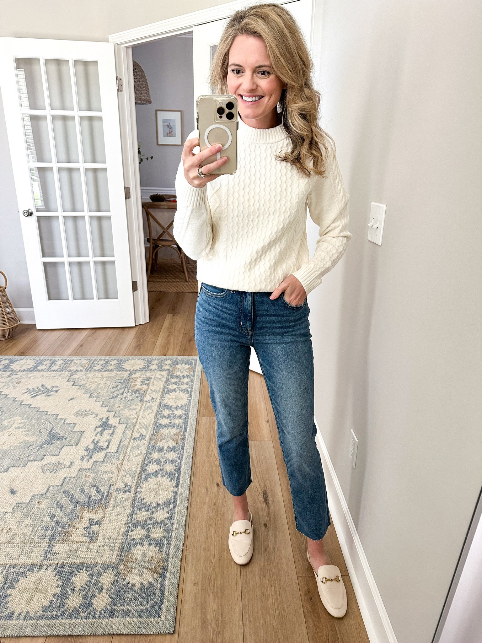 A beautiful cream cable knit sweater. I could see this sweater paired with a pretty skirt or dress pants for the holidays. I am wearing the XS

#LTKGiftGuide #LTKfindsunder50 #LTKHoliday