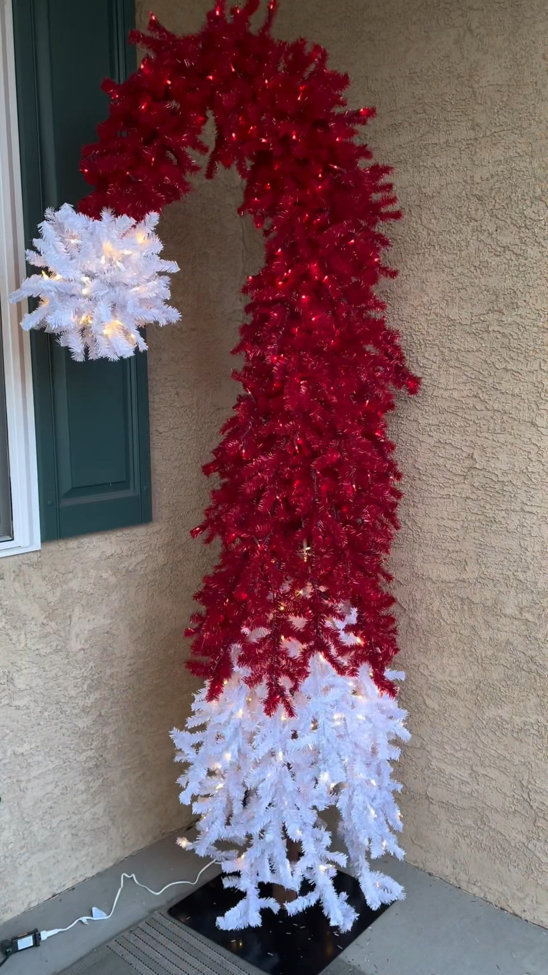 This 9' Holiday Red Santa Hat faux Christmas tree is such a statement piece 🎅🏼 Whether you make your front porch festive or place it inside, this will be a conversation starter. This Christmas tree is pre lit and has over 1900 branch tips. 

#christmasdecor #santahat #christmastree #viralchristmastree #christmas2025 

#LTKSeasonal #LTKHome #LTKHoliday