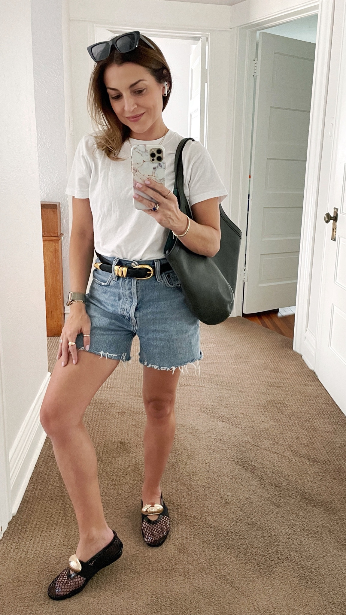 Wearing XXS in the tee, 23 in the shorts, XXS belt, 5.5 shoes (run loose). The bag I’m wearing is the small size, but the regular size one is on sale + an extra 15% off 