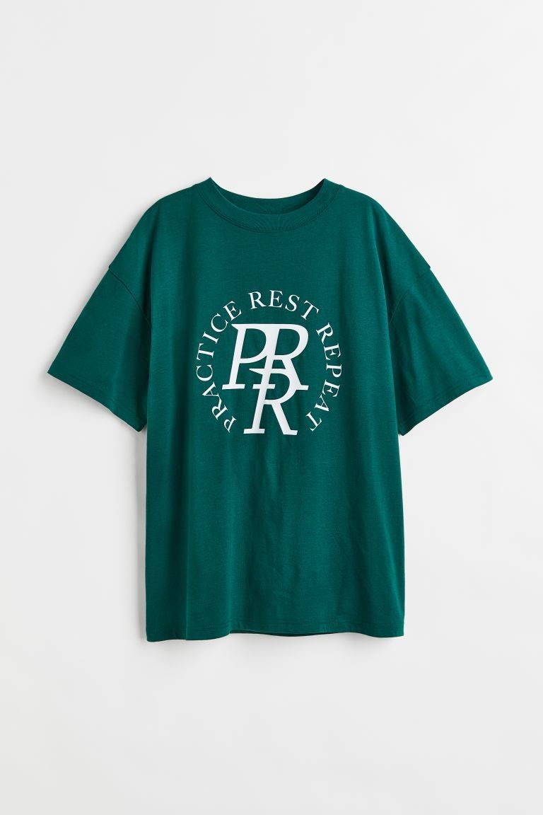 Conscious choiceNew ArrivalEen T-shirt van tricot met een relaxte pasvorm en een geprint motief v... | H&M (DE, AT, CH, NL, FI)