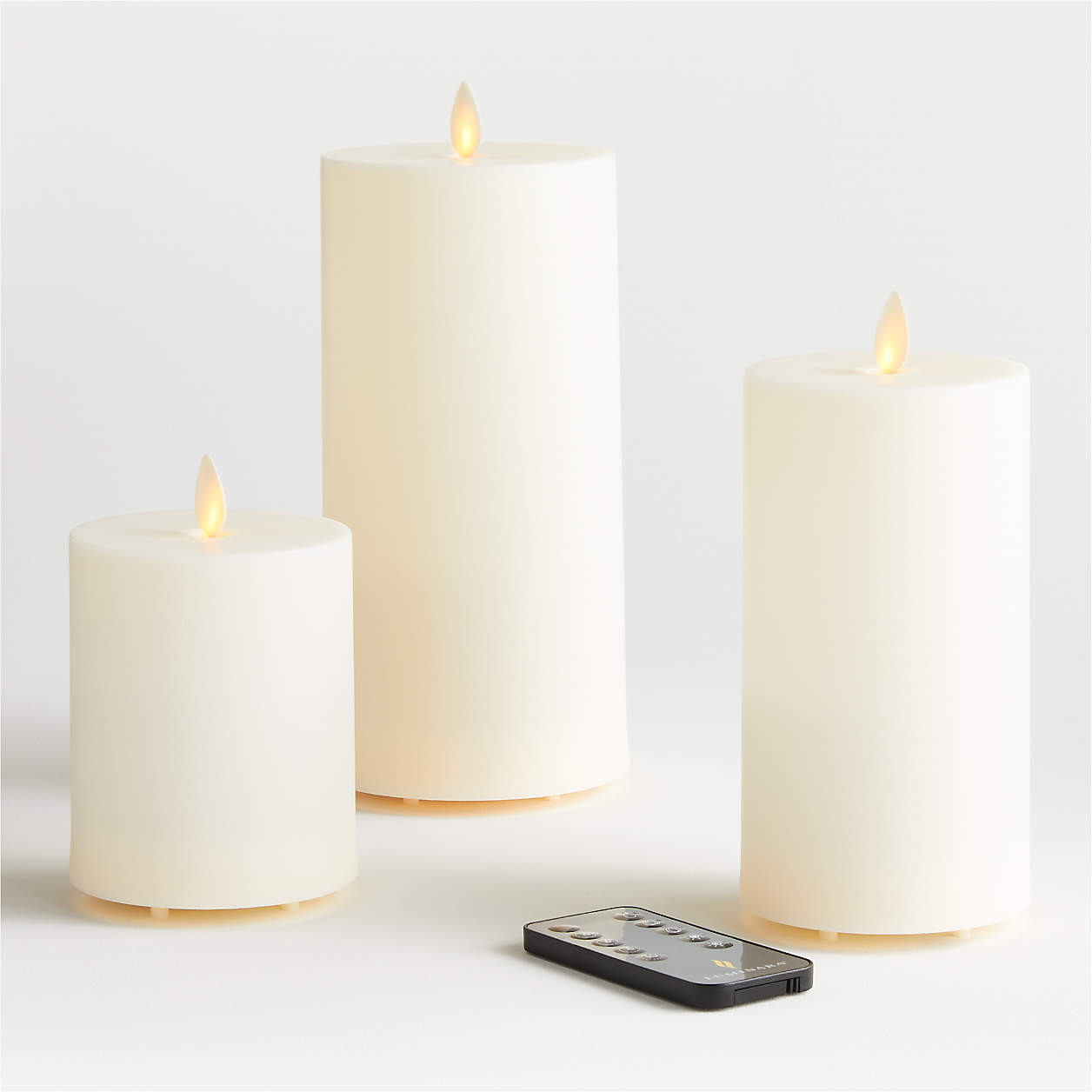 Flicker Outdoor Flameless Pillar Candle 4"x8" + Reviews | Crate & Barrel | Crate & Barrel