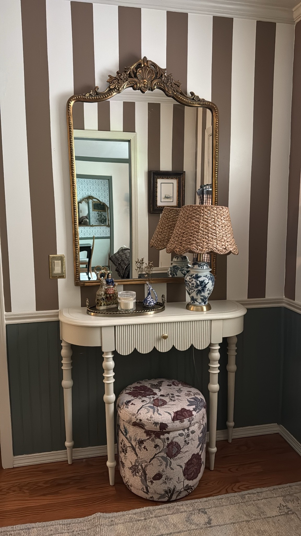 I ended up getting this round floral storage ottoman too. Trying it out in the entryway. Also linking the chinoiserie lamp base, scallop rattan woven lampshade, metal tray with braided handles, and ornate gold mirror.

#LTKHome #LTKSaleAlert #LTKSeasonal