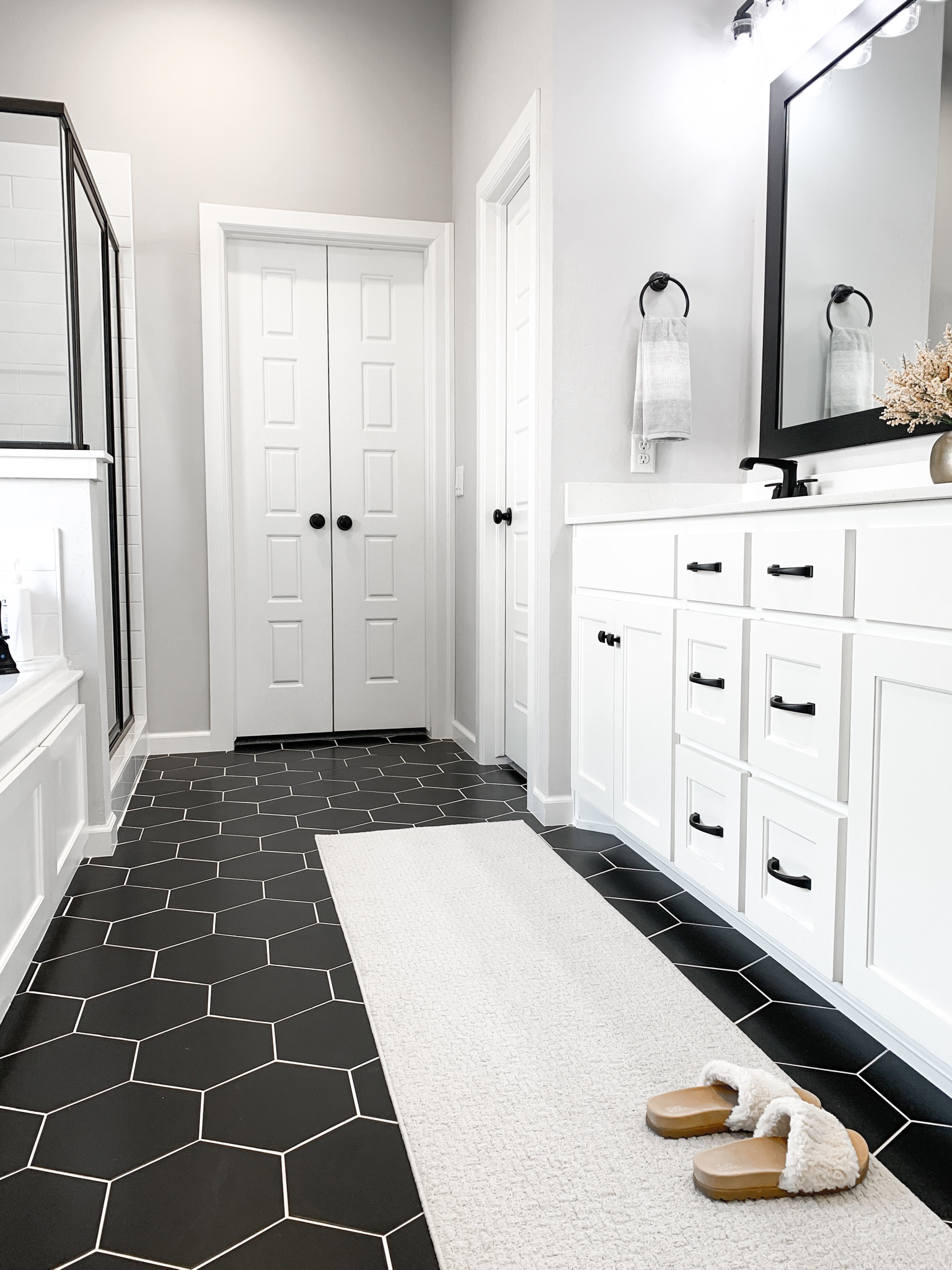 My favorite washable runner in a different bathroom. Love the contrast of it on the black floors. It does also look really nice on the wood tile in our son’s bathroom.

Home decor, bathroom decor, washable runner, bathroom rug, neutral decor, house slippers, neutral slippers, hand towels, vase, countertop decor, bathroom decor, hexagon tile, black floor tile

#LTKhome #LTKunder50 #LTKstyletip