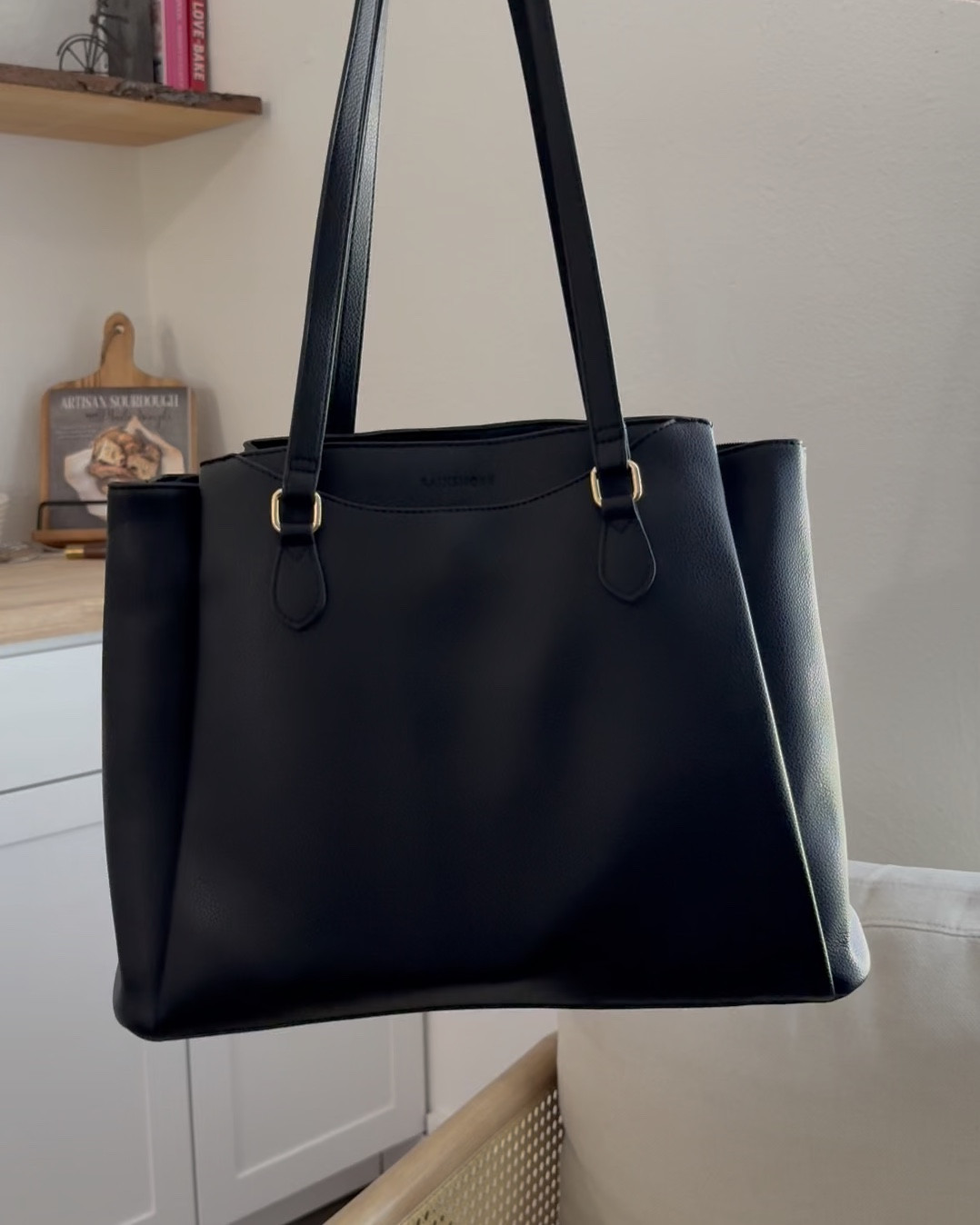 Don’t sleep on this work tote! The material is so soft and feels very sturdy. I absolutely love all the exterior pockets (perfect for a book or kindle!) and the laptop sleeve. I just replaced a much bulkier tote than this one and so far this one is worth it!!

#LTKStyleTip #LTKFindsUnder50 #LTKWorkwear