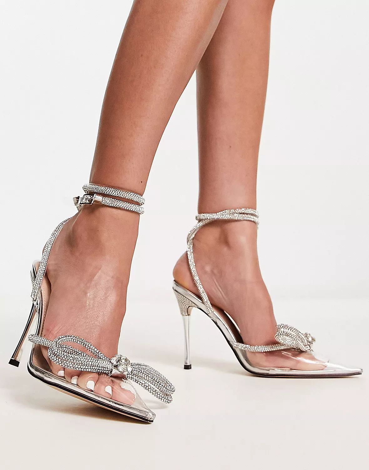 Public Desire Midnight heeled shoes with diamante bow detail in silver | ASOS (Global)
