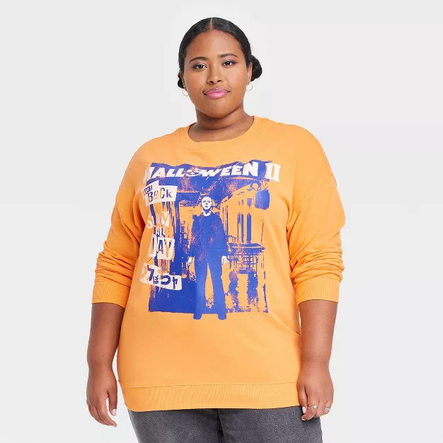 Women's Halloween Movie Graphic Sweatshirt - Orange | Target
