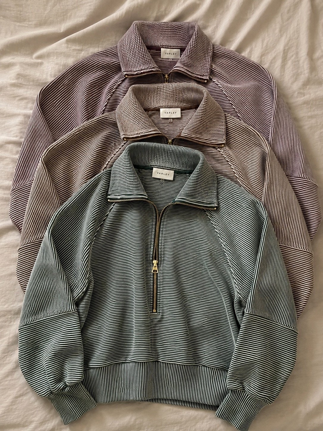 VARLEY MILANO HALF ZIP SWEATSHIRT ☁️🤍

The cutest elevated basic you’ll wear on repeat. The Milano Half Zip has an oversized, relaxed fit with buttery soft fabric, gold hardware, and the prettiest stripe that makes it feel so luxe. I love layering it over leggings for coffee runs, travel days, or cozy mornings…it gives that effortless “put together” look without even trying. ✨💕