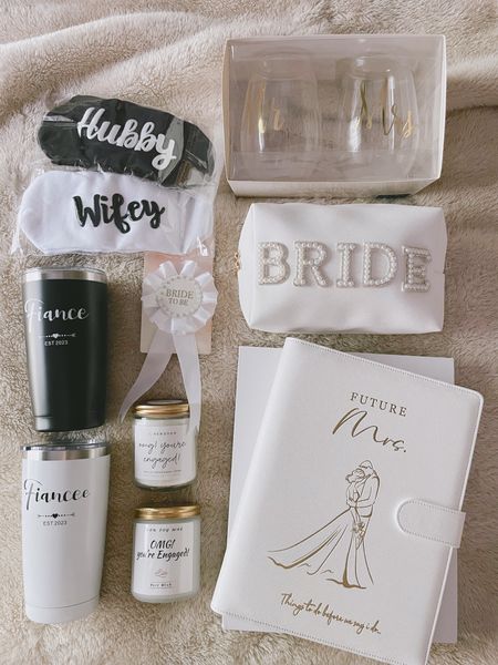 The sweetest engagement gifts we received!!! One of them being the HOLY GRAIL of all wedding planning books - I can’t wait to start filling it out 🤍🫶🏼 
#bridal #wedding #engaged #weddingplanning 

#LTKwedding #LTKFind #LTKunder50