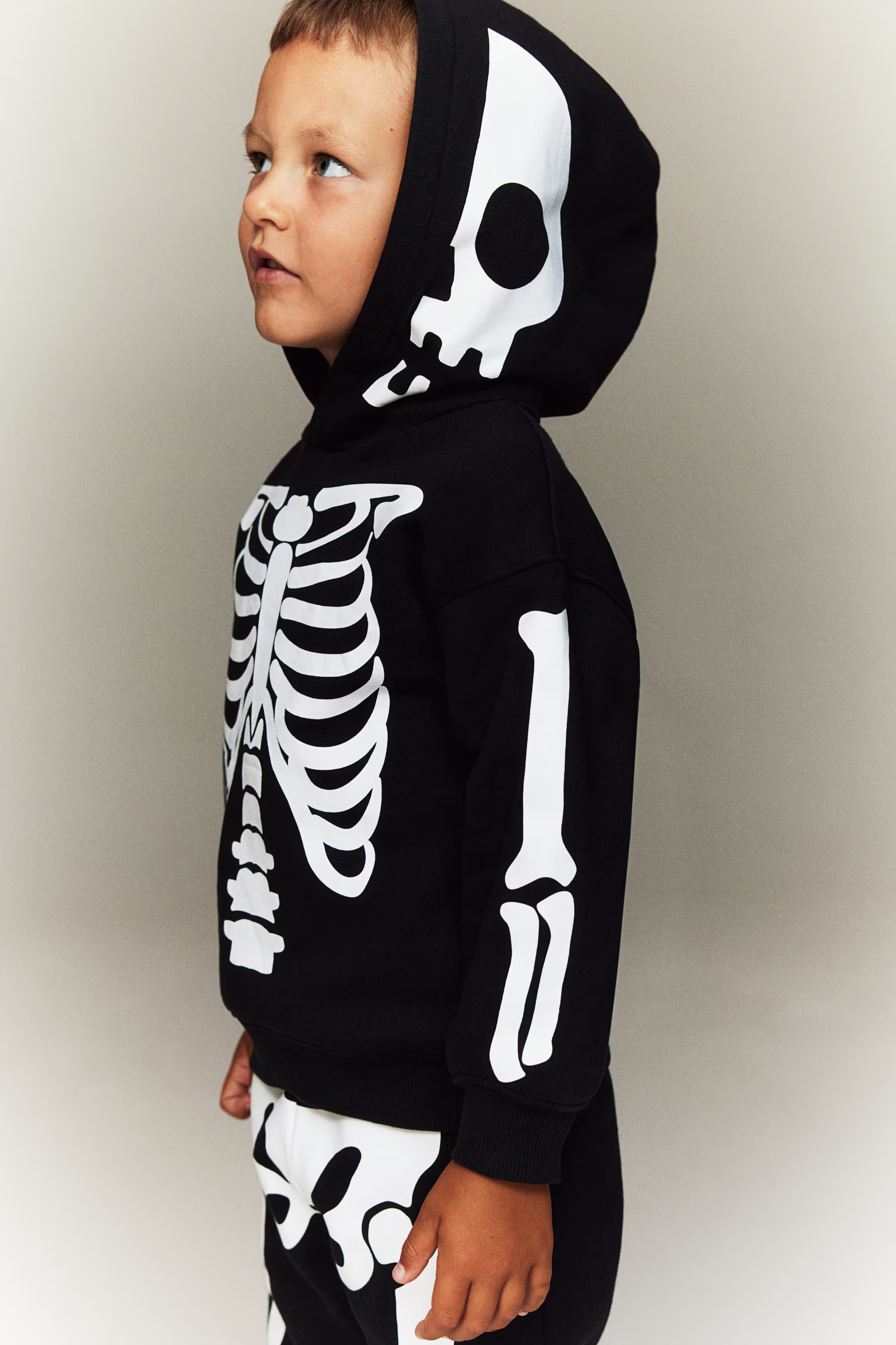 2-piece Printed Sweatsuit - Regular waist - Long sleeve - Black/skeleton - Kids | H&M US | H&M (US + CA)
