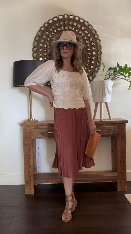 Spring outfit styling with the perfect pleated skirt.  You can wear this so many different ways.  

#LTKfindsunder100 #LTKSeasonal #LTKover40