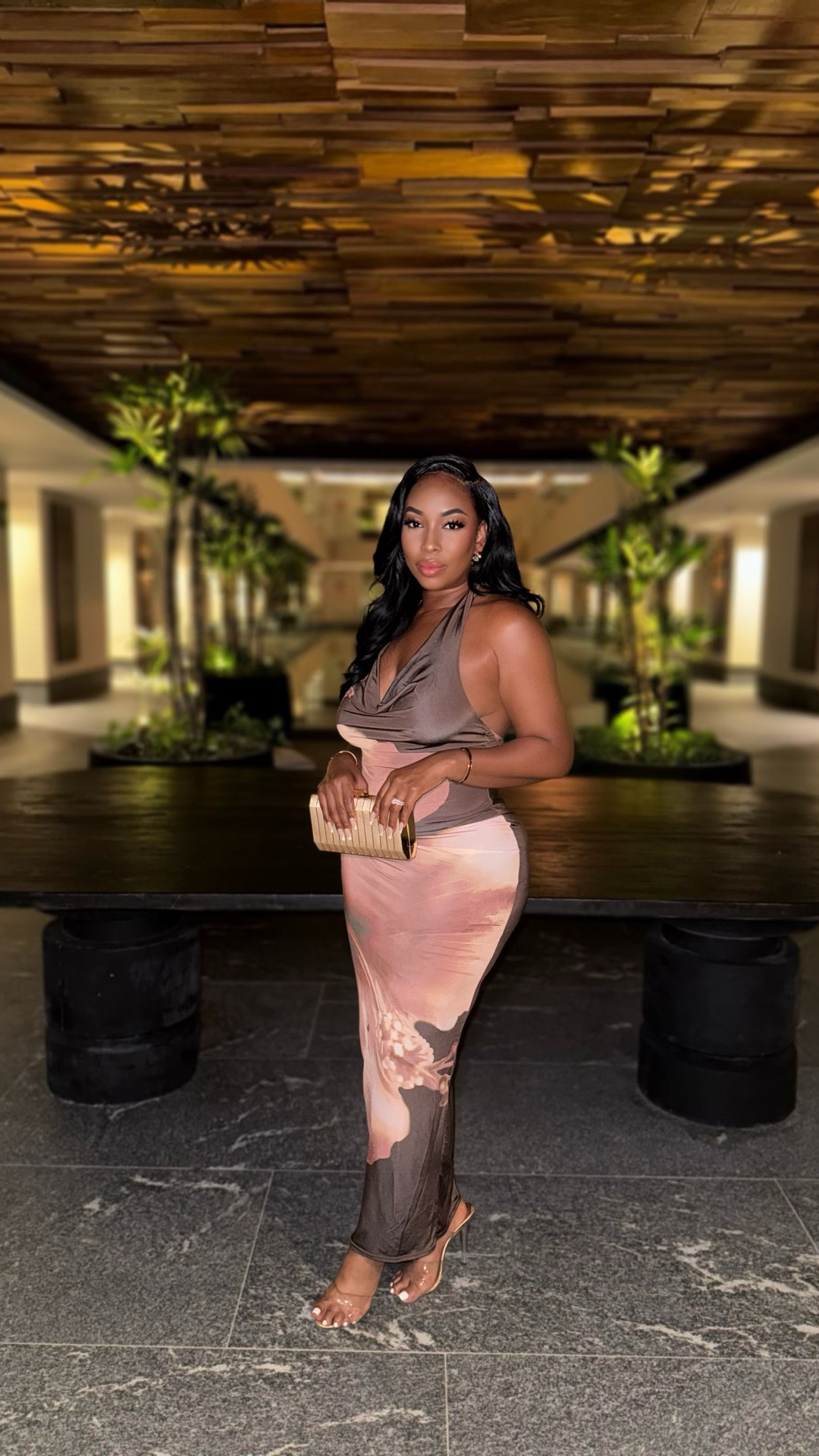 Wore this dress for my honeymoon and I absolutely adore it! The brown hues really looked amazing against my tanned skin. Super stretchy which I usually need in my outfits. Definitely a head turner. Dress is from Fashion Nova. Shoot me a message for the exact link  ✨