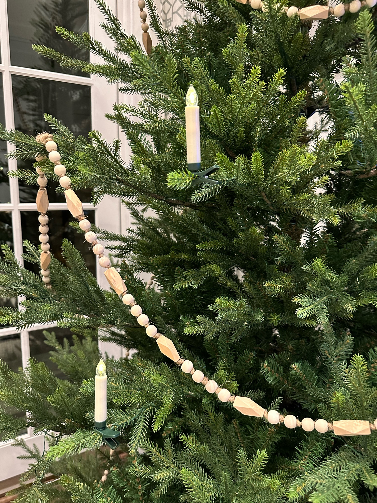 Starting to decorate my tree! Love these pretty clip on candles! ✨ This bead garland is also a favorite! 🎄

#LTKSeasonal #LTKHoliday #LTKhome