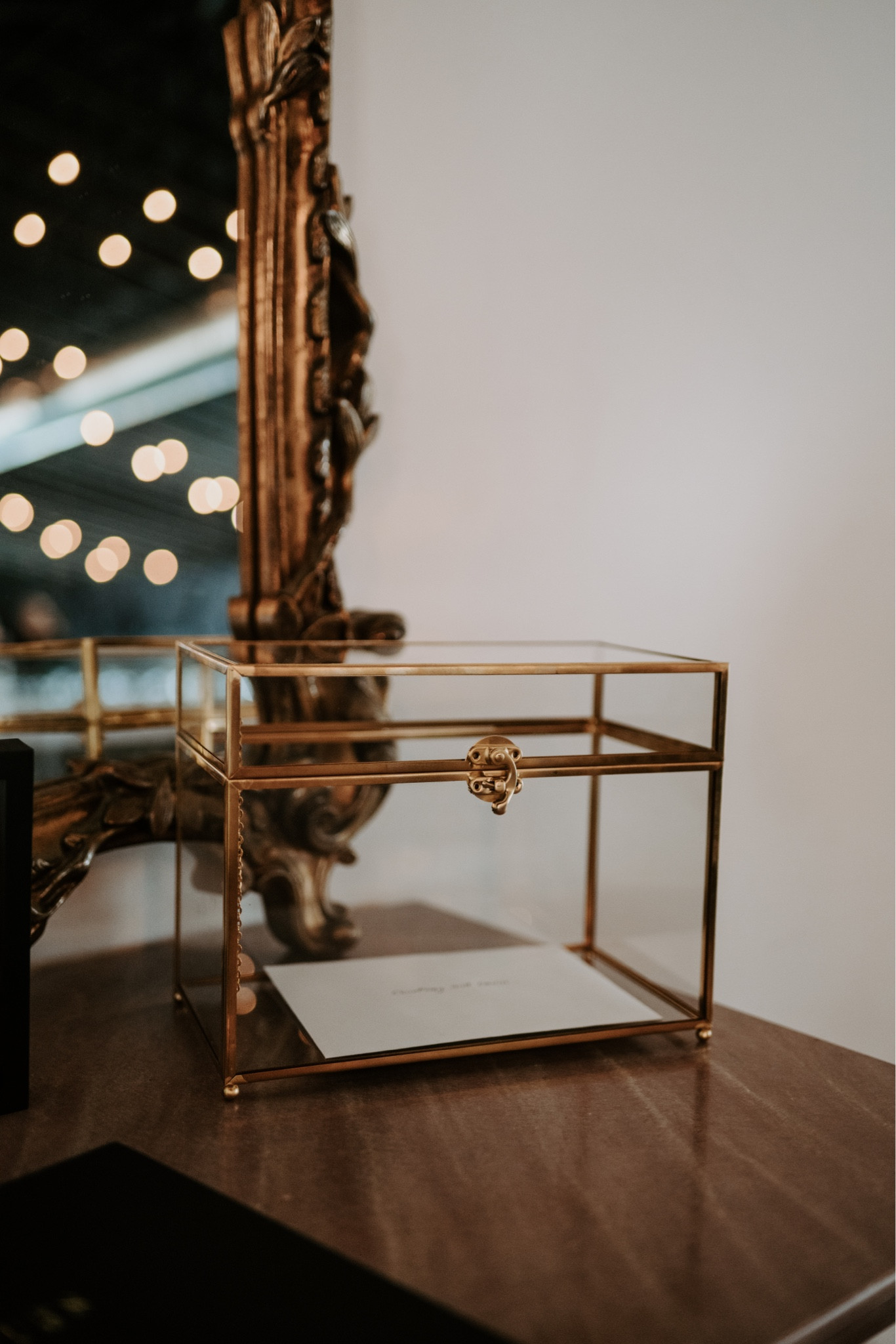 Used this glass and gold box as a card box for my black and gold winter New Year’s Eve themed wedding! 

#LTKwedding