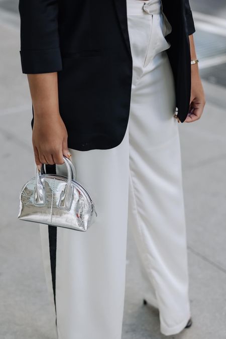 Obsessed with these oversized wide-leg satin trousers. Perfect for a holiday  outfit. And less than $40! Size down. #nyeoutfit #holidayoutfit 

#LTKstyletip #LTKunder50 #LTKHoliday