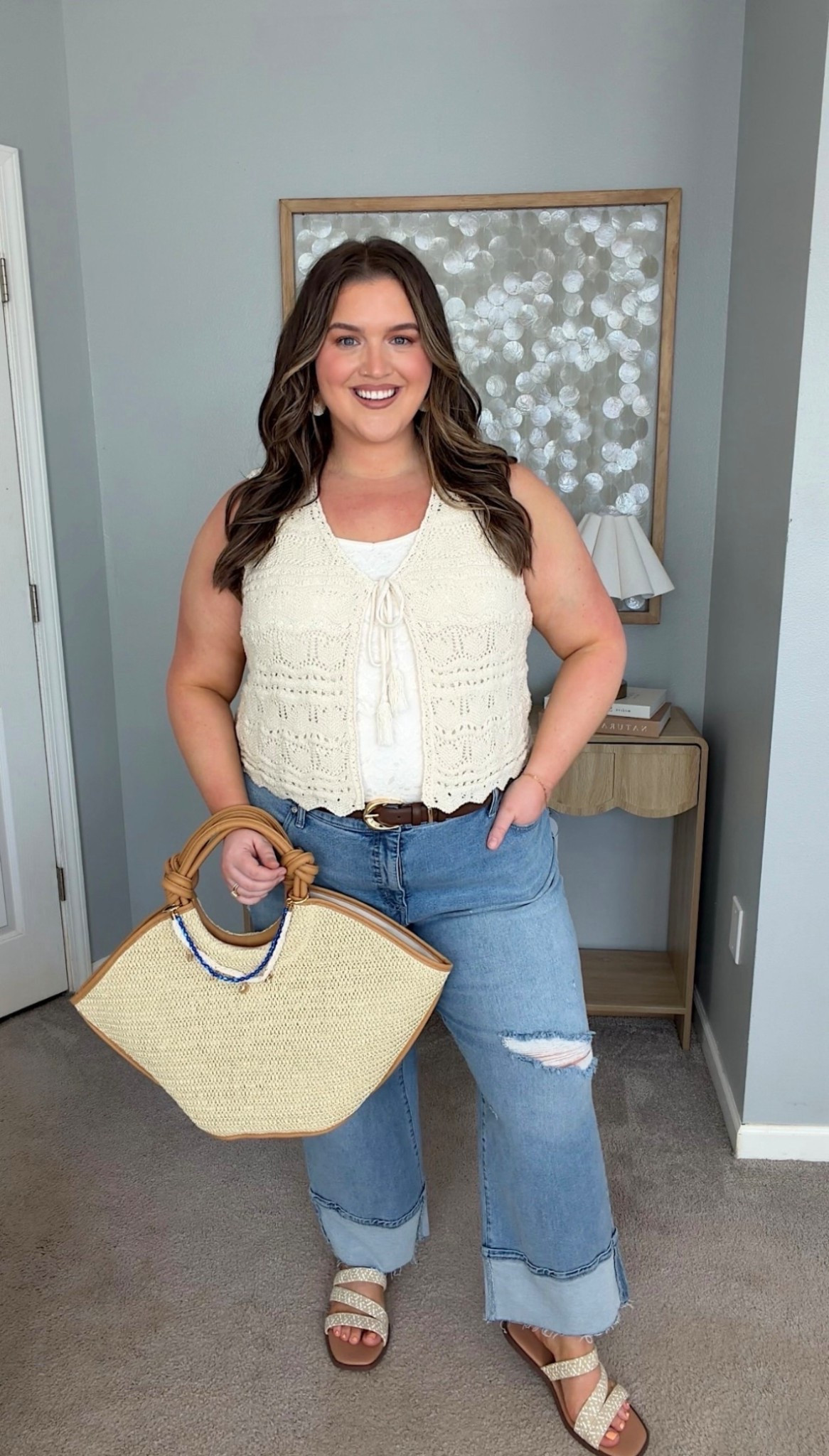 I feel so good in this adorable boho spring look. This crochet vest is so cute, I love it paired with these cuffed jeans. This is giving major cool girl energy 🆒 and I am here for it. These wide width friendly sandals have the perfect amount of embellishment.
Crochet best, raffia bag, cuffed wide leg jeans

#LTKSaleAlert #LTKPlusSize #LTKSeasonal