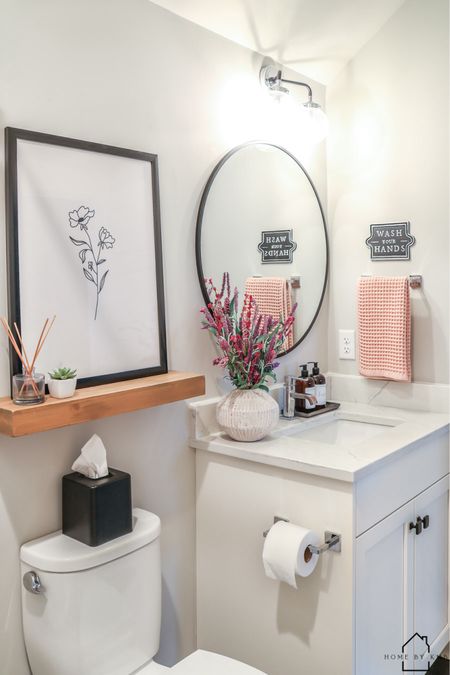 Hi friends 👋🏻 happy spring! 🌸
•
•
•
#homebykmb #smallbathroom #targetstyle #bathroomdesign #bathdesign #bathroomdecor #bathroomstyle #bathroomvanity #modernbathroom #bathroominspiration #bathroominspo #bathroomsofinsta #bathroomofinsta #guestbathroom #whitebathroom #blackandwhite #springdecor #springdecorating #springbathroom #springhomedecor #springhome 

#LTKhome #LTKSeasonal