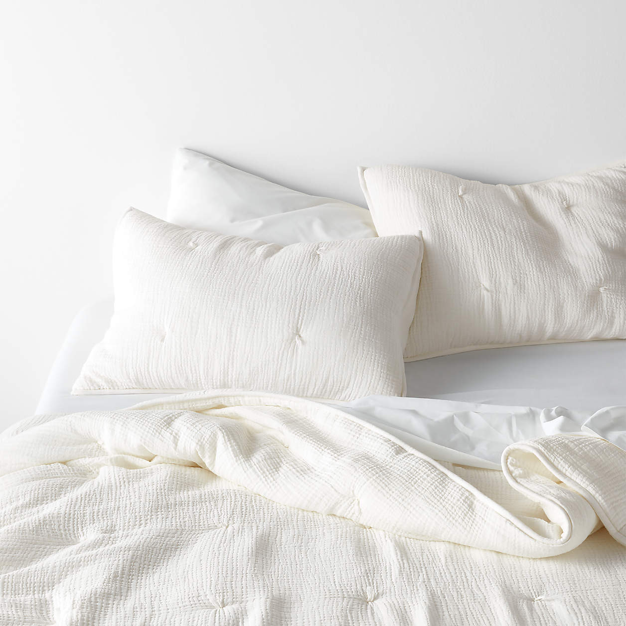 Aire Crinkle Organic Cotton Linen Blend Cream Comforter and Pillow Shams | Crate & Barrel | Crate & Barrel