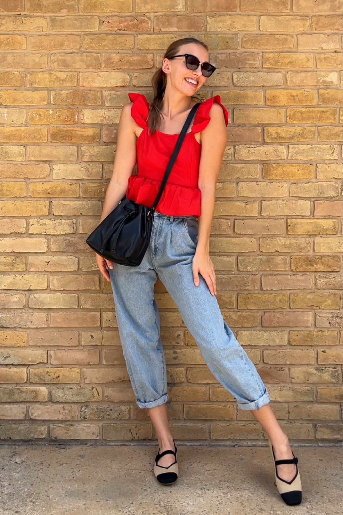 Dear red top, where have you been all my life? 😍

- 5’7” Wearing S in the top!
- VIVAIA flats size 8 (normally a 7.5 but sized up and they’re perfect). 
- Bag is the SMALL bucket from PLG 
- Jeans are thrifted (Zara)

#peplumtop #balloonjeans #zarajeans #leatherbags #popsofcolor #balletflatsoutfit #summertofalloutfits

#LTKFallSale #LTKSeasonal #LTKStyleTip