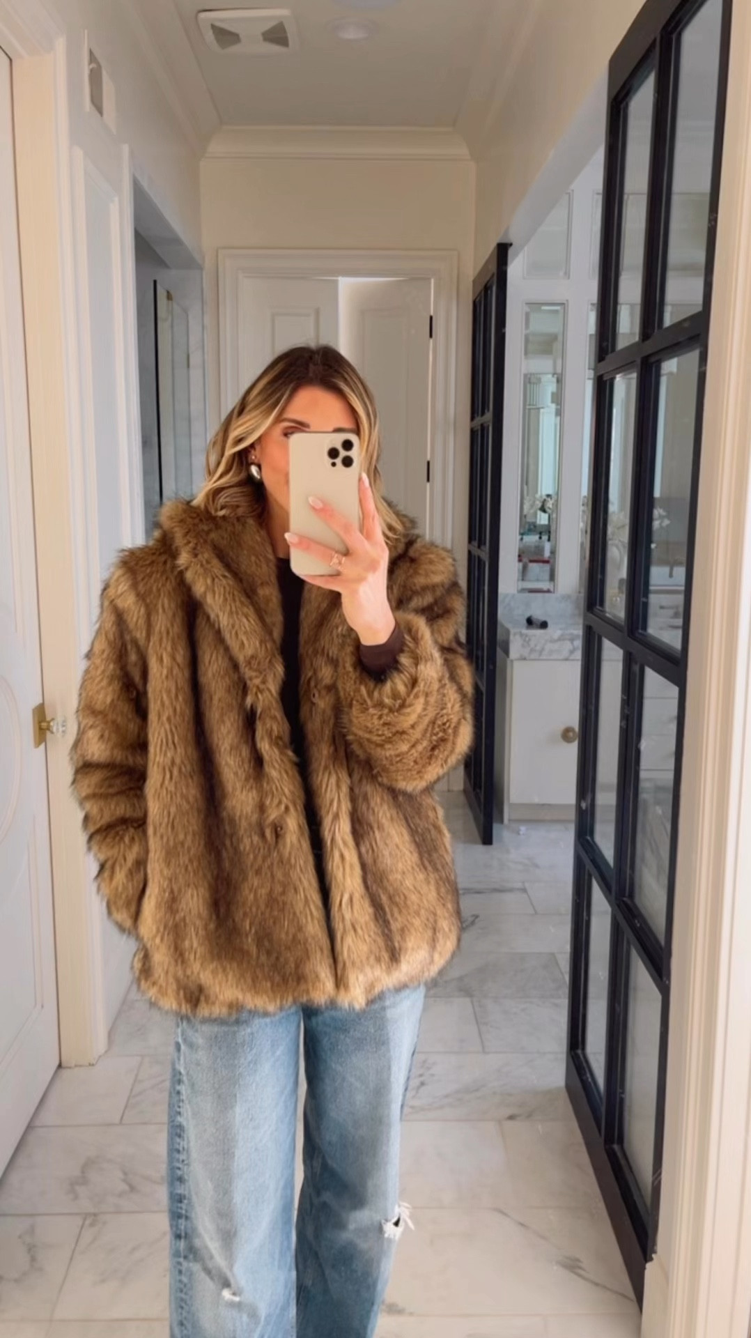 This stunning faux fur coat is under $200 -wearing size smalll