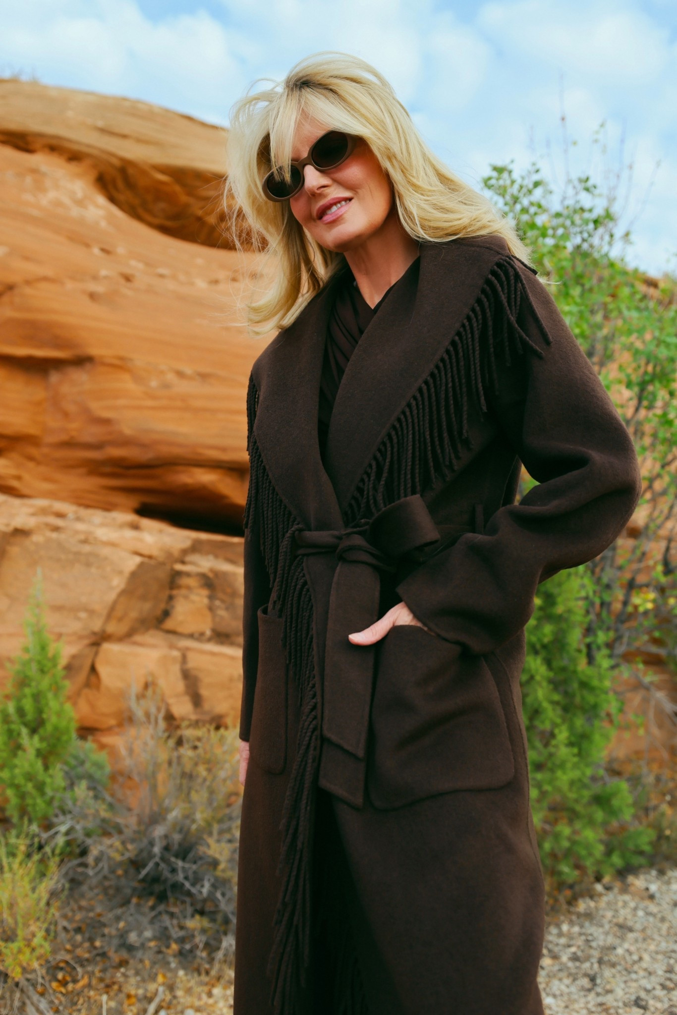 The “Carrie” coat by SIMKHAI, is one of my favorite finds of the season. It’s beautiful, elegant, and truly a standout coat that I’ll be picking up time and time again. It has fringe trim along the hem and collar of the coat which gives a subtle western flair. Both western details and the color chocolate brown are VERY on trend this season, which is just another reason to fall in love with this one.

With a longer length, tie waist, and the fringe detailing, this piece brings a little fashion drama (in the best way).

~Erin xo 

#LTKStyleTip #LTKSeasonal