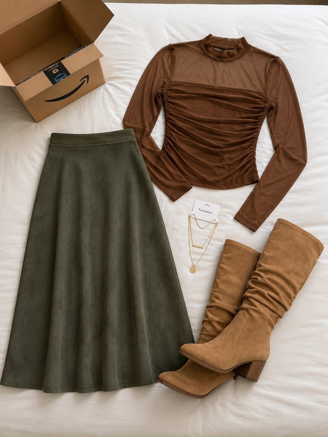 Brown + olive might be the prettiest fall color combo. The ruched top, flowy midi skirt and slouchy boots make this look feel so put together without being overly dressy. 🍂

#LTKNYFW #LTKgrwm #LTKootd