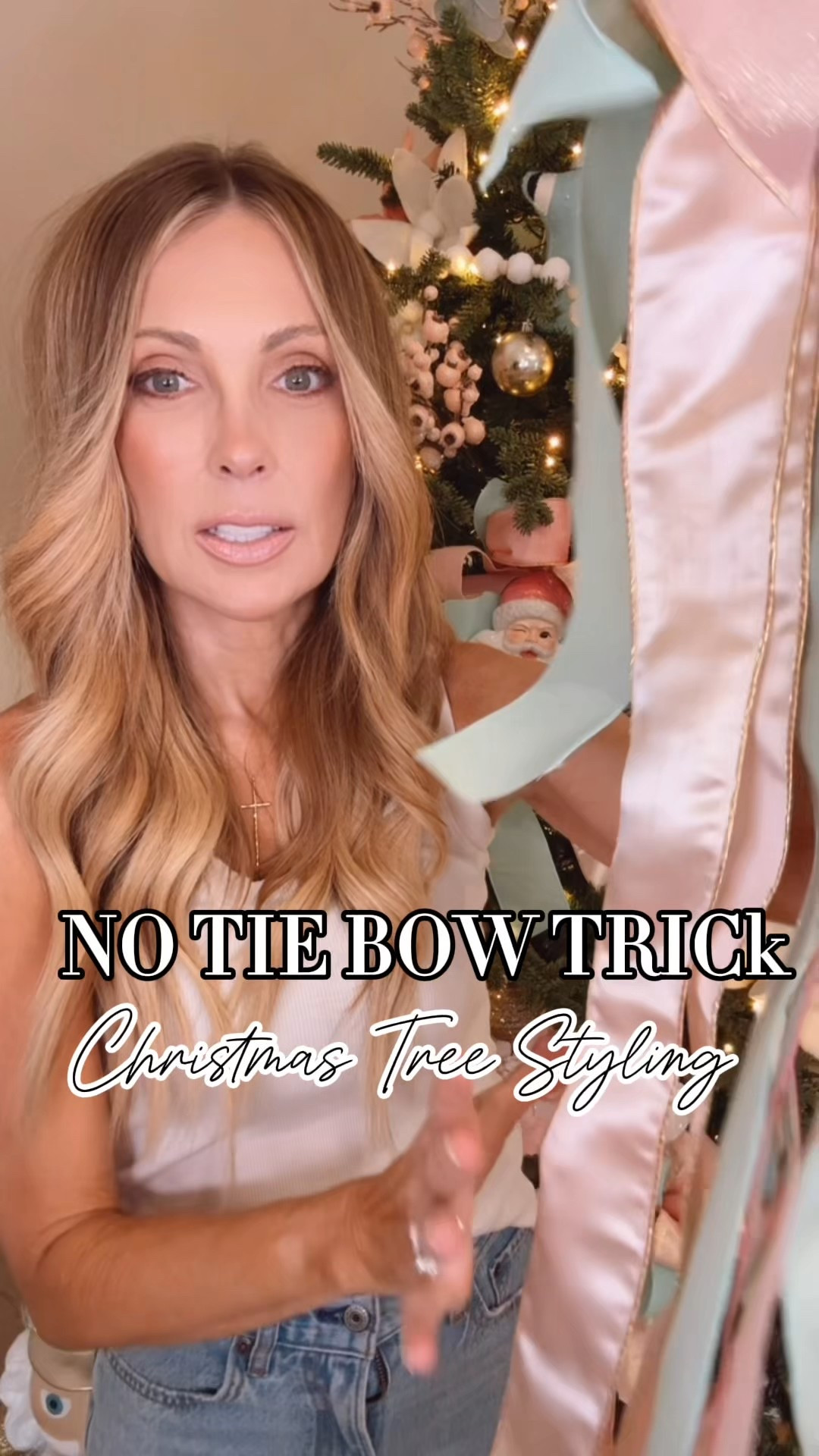 No tie bow trick!  

Cut 6 strands of ribbon, about 16 inches. 

Stack on top of one another and just loop around and secure with a faux branch. If you have a real tree, just use green floral wire to twist tie the center and secure to tree. 

Pull apart each loop and "puff up." 

This Home Depot tree works really well for this and it has various light snow options. 

#LTKGiftGuide #LTKstorytime #LTKHoliday