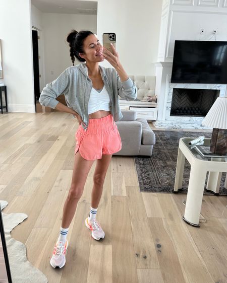 Workout look today for the gym ✨ these bright colored shorts make me so happy! 
Sizing:
Shorts - small 
Top - small
Hoodie - small

Workout style; spring style; athleisure style; gym outfit; free people movement; adidas ultraboost; Amazon fashion; Christine Andrew 

#LTKfit #LTKstyletip #LTKunder50