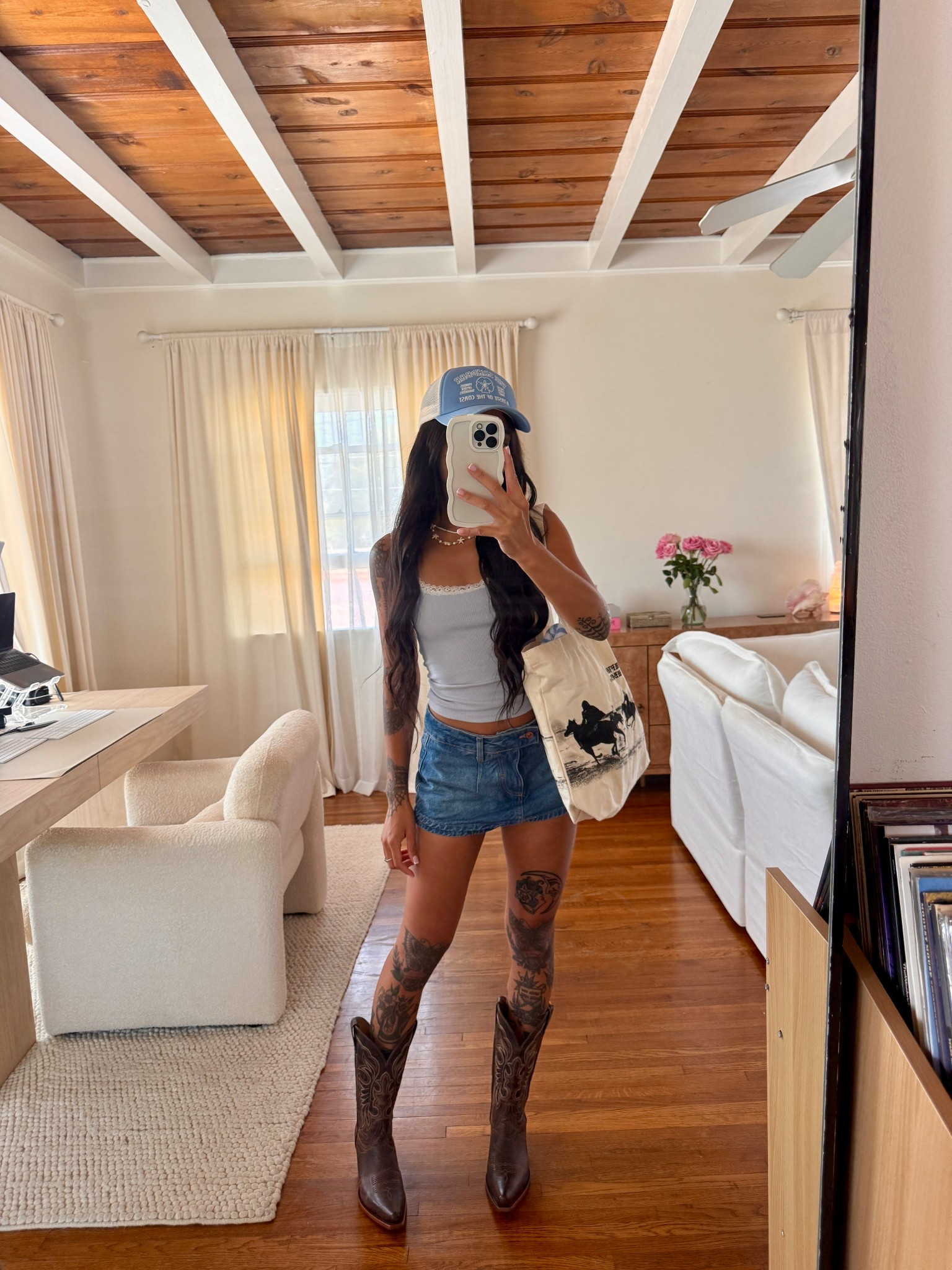🌊 Coastal cowgirl goes casual 🤠 Denim cutoffs, a classic tank, and a blue trucker hat keep it laid-back, while these rugged cowboy boots pull the whole look together. Perfect for summer market runs or a beachside bonfire. Tap to shop the essentials! #LTKFinds #CoastalCowgirl #SummerOOTD

#LTKStyleTip #LTKSeasonal #LTKFindsUnder100