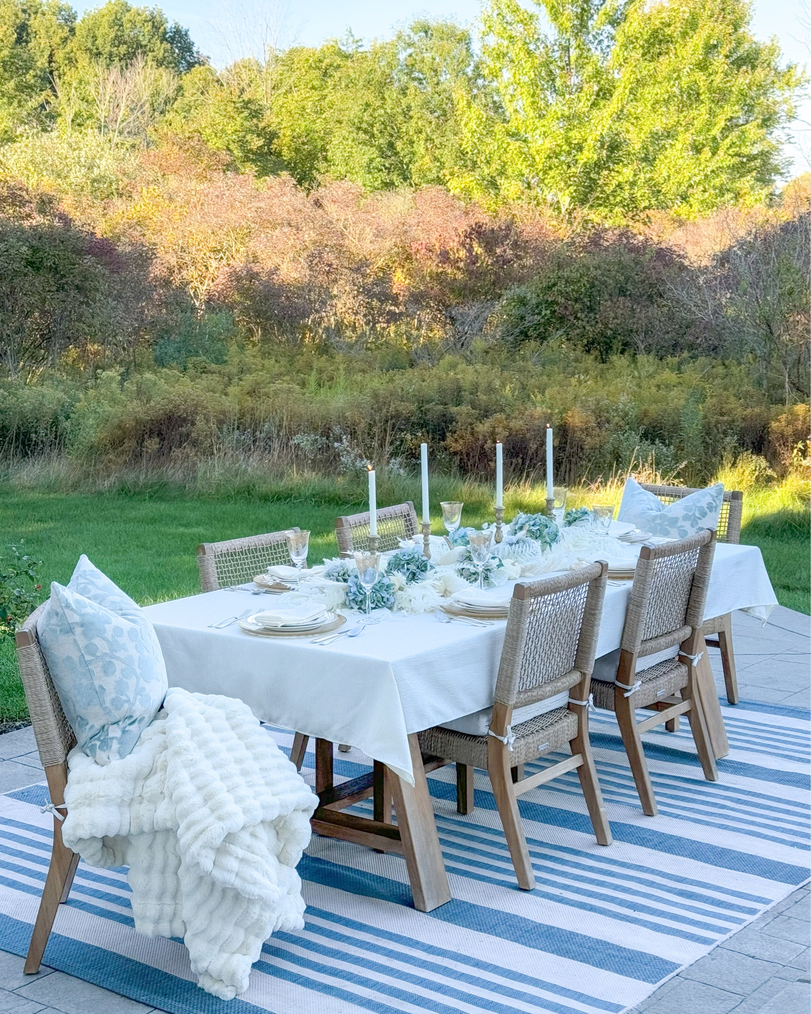 Shop my coastal fall tablescape! 

**Cream Oak linens are from loomandtable.com**

Blue and white home, grand millennial decor, coastal decor, coastal vibes, blue hydrangeas, fur blanket, floral pillows, velvet pillows, cream linens, ivory candles, gold candleholders, gold chargers, throw pillows, white pumpkins, pampas grass, fall decor, fall decorating, fall entertaining, patio decor, fall porch, fall patio, fall party

#LTKHome #LTKParties #LTKSeasonal