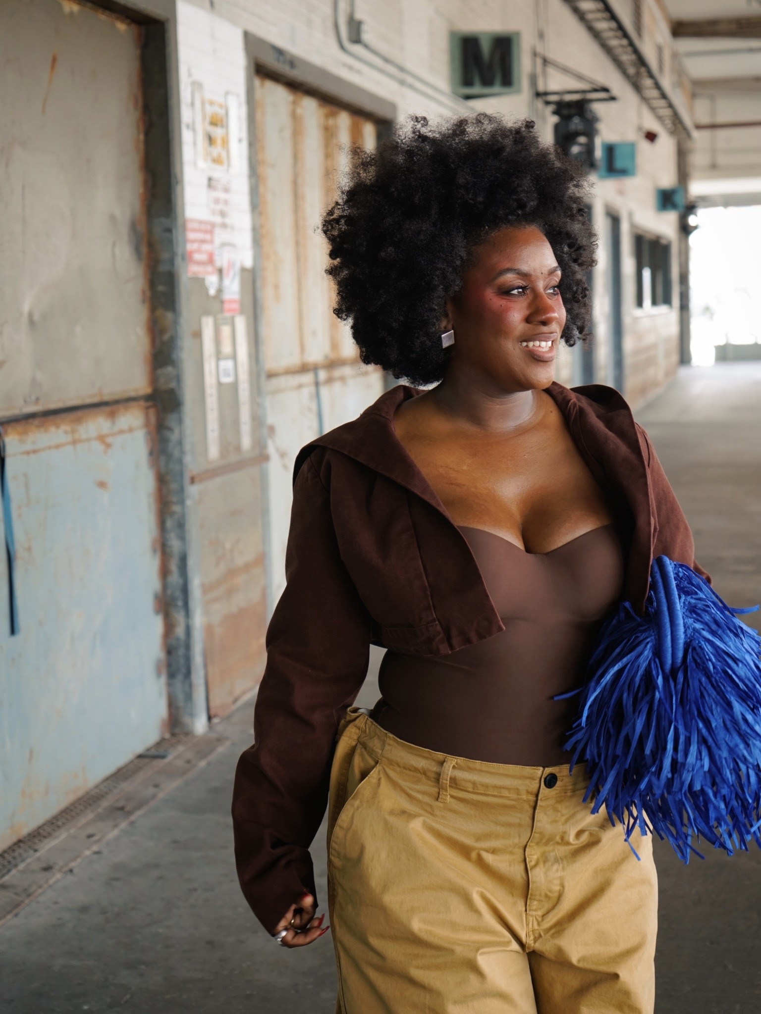 Jorts, brown bodysuit and raffia bag