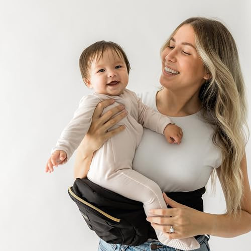 Tushbaby Original Hip Seat Baby Carrier for Babies & Toddlers up to 45 lbs, Safety Certified, Lightweight No-Foam Design with Storage, Black & Gold | Amazon (US)