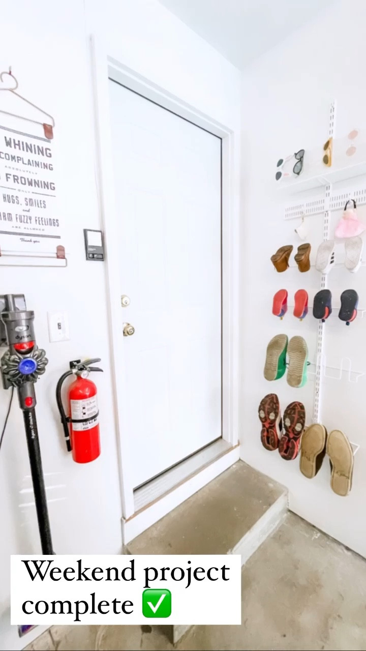 This is my garage. I don't have a fancy locker area, but I did have an empty wall. And I'm telling you, that shoe pile was a serious problem.
•
So, I enlisted the help of my absolute favorite product from @thecontainerstore, the ELFA system. Virtually the same system that you would use on a door.
•
But in this case, we wall-mounted that puppy and it provided space for all the big shoes, the little shoes, the masks and the kiddo's sunglass collection. And eliminated that dreaded eye-sore of a pile.