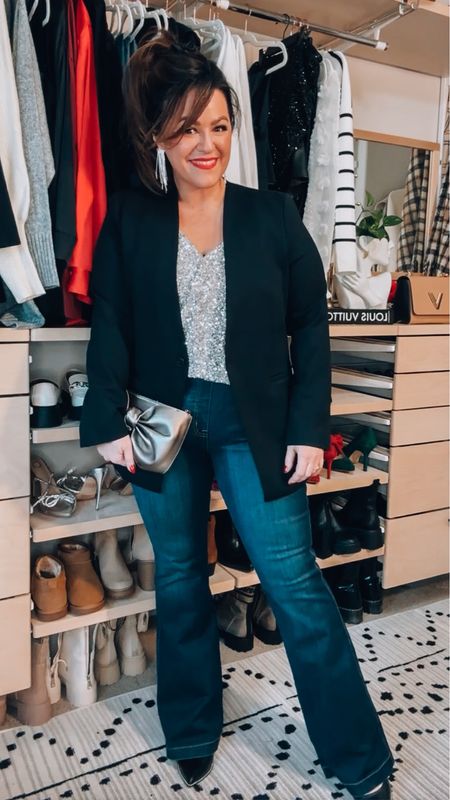 Midsize holiday outfit - holiday party outfit- nye outfit 
Sparkly bodysuit xl 
Blazer large super stretchy and comfy 
Smoothing flare jeans wearing an xl 
Code: TARYNTRULYXSPANX saves on the jeans and blazer 
Bow clutch amazon 
Heels tts 

#LTKcurves #LTKHoliday #LTKSeasonal