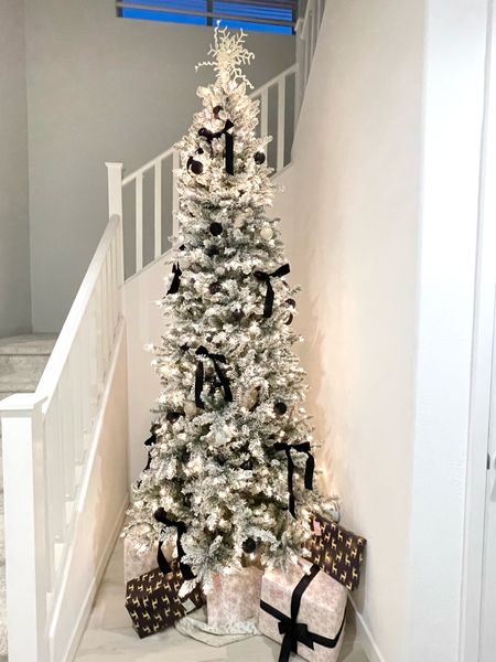 I found the perfect slim 9’ flocked Christmas tree for this little nook in my house. I made some velvet bows with fabric from Amazon and love the black accents  

#LTKSeasonal #LTKhome #LTKHoliday