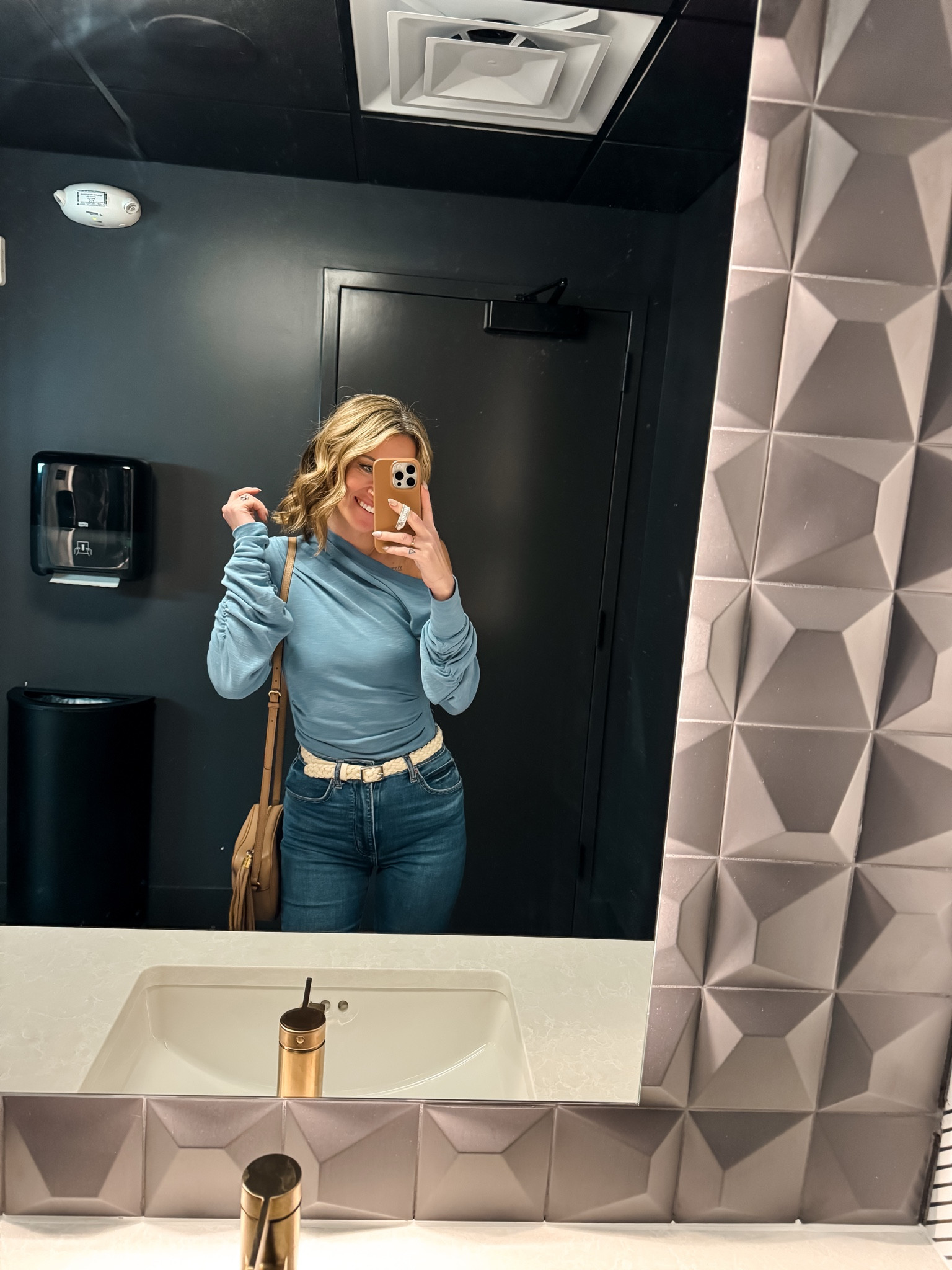 Date night outfit ideas 
Flare jeans and a white braided belt pair with the Gucci Soho disco bag