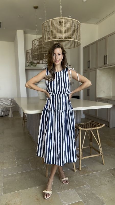 Spring and summer outfits; striped dress and ruffle skirt paired with one shoulder white top. The top is great for pairing with so many other pieces! 

#LTKstyletip #LTKSeasonal #LTKVideo
