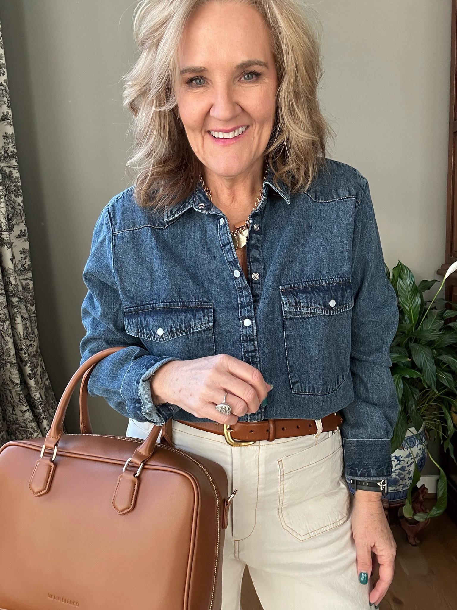 I love this color palette with the denim shirt, the ecru pants, and the tan/cognac belt and purse. A classic color combo.

Colette pants with the contrast stitching I am wearing a size 29 regular 
Denim shirt I did size up to a large, so it would be a bit oversized, there is no stretch in this fabric 
Belt size, large, but I did have to add another hole 
I love anthropologies bags, their vegan, and really well done. This one comes with two straps and a bad charm. 

Business casual workout teacher outfit, denim shirt, Pilcrow denim shirt, a crew jeans, acro pants, Colette pants

#LTKItBag #LTKWorkwear #LTKOver40