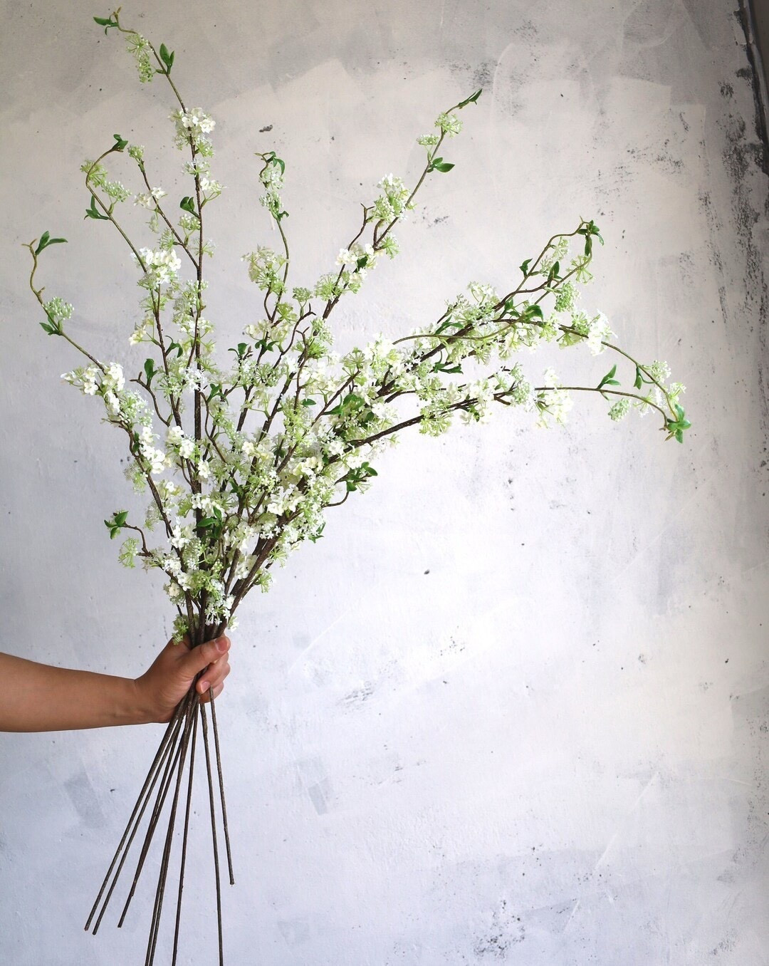 These faux blossom branches are one of those quiet showstoppers 🌸 With realistic brown branch-style stems and soft fabric blooms, they come to life once styled in a vase, adding height and natural movement to any space. Fully wired and easy to shape or trim, they’re perfect for DIY arrangements, seasonal styling, or everyday décor that feels effortlessly elegant.
#LTKfinds #EtsySupplies #FauxFlorals #BlossomBranches #FloralStyling #HomeDecorIdeas #DIYDecor #EverlastingBlooms

#LTKSeasonal #LTKHome #LTKHoliday