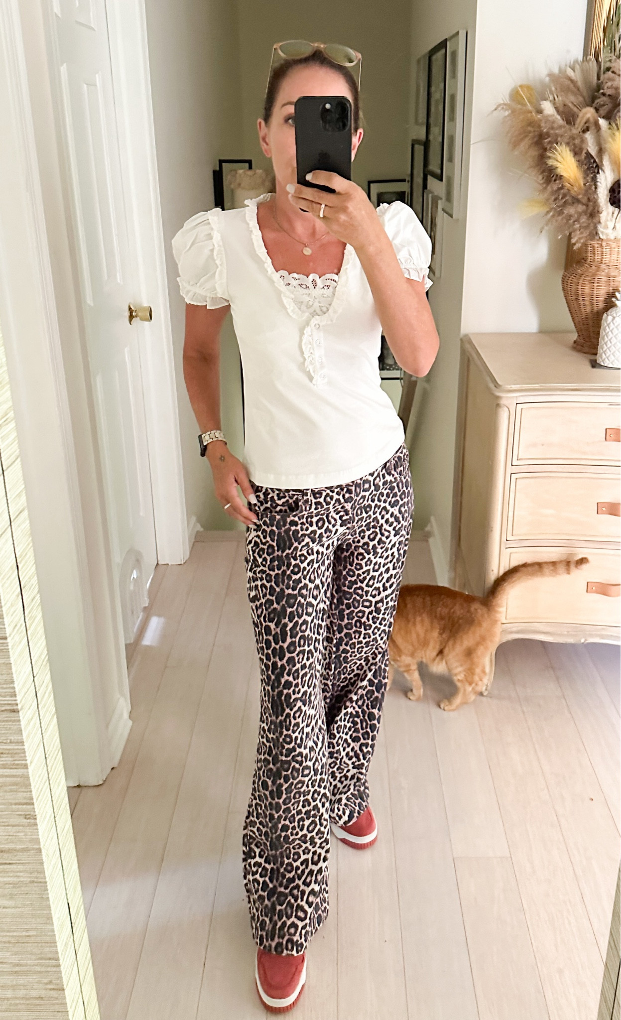 These leopard jeans have been on sale for a while now and are my absolute favorite. I love them with this cute white t-shirt that looks like a blouse and my red puma sneakers. I’m wearing size 25 short in the pants and small in the t-shirt because I didn’t want it to be too tight 

#LTKSaleAlert #LTKOver40 #LTKStyleTip