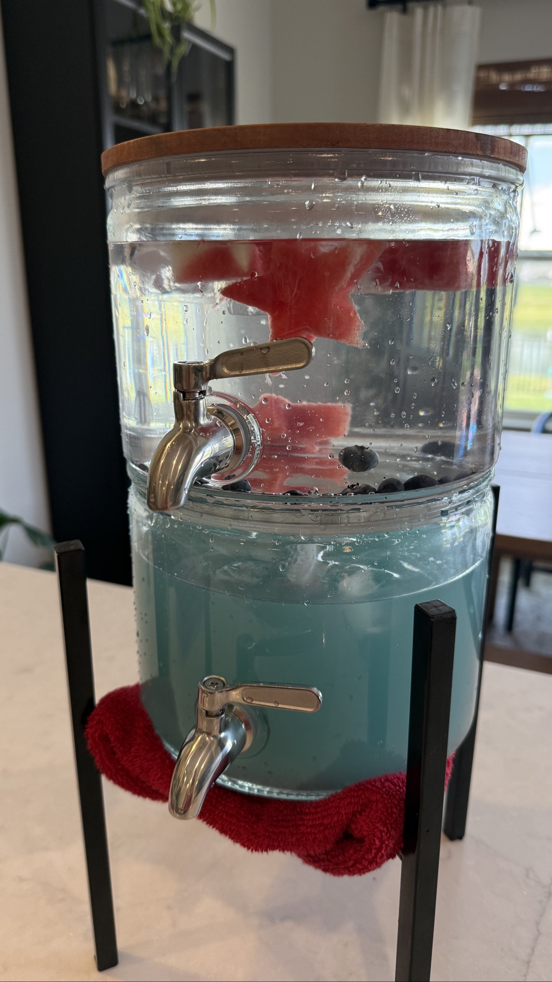 This glass double-stack drink dispenser was such a good find! 🤍 I used it for our Fourth of July party and it made serving drinks so easy while looking so pretty on the counter. I also love that it’s made with glass instead of plastic, making it a great non-toxic option, and it’s surprisingly affordable too. Definitely one of those hosting finds I’ll be reaching for all summer long!#LTKfinds #LTKhosting #hostesswiththemostess #summerhosting

#LTKHome