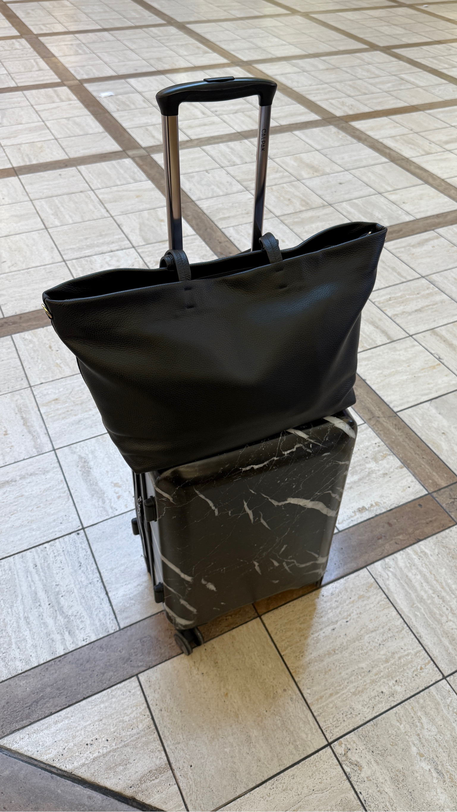 Favorite tote bag and luggage to travel with ✈️ This tote bag has a zipper top closure to keep all your belongings safe. Can hold so much inside. My marble luggage is on sale—love the marble design to differentiate yours from the sea of black luggage. Would make a chic gift for the traveler. 🎁

Travel must haves, travel essential, tote bag, tote, luggage, sale, gift ideas, gift guide, The Stylizt



#LTKGiftGuide #LTKItBag #LTKTravel