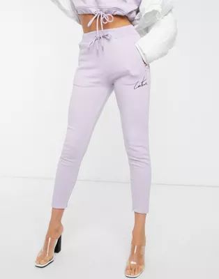 The Couture Club tapered motif jogger in lilac | ASOS US
