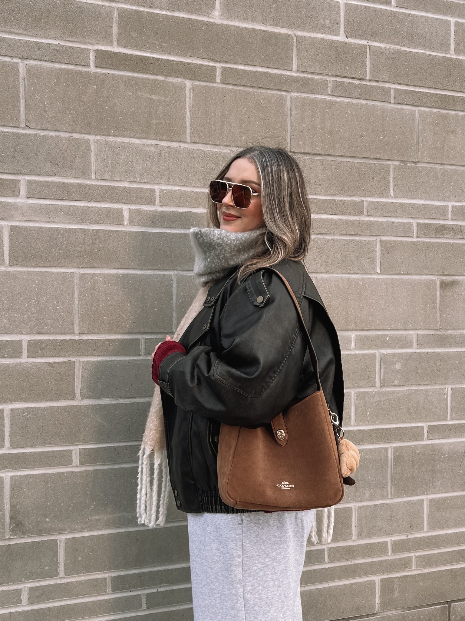 My suede Coach bag is on sale! It’s the perfect size for everyday and I reach for it constantly. Also linked my leather jacket (& similar), sweatpants, and sweater. Wearing my usual size L in all!

#LTKbag #LTKsale #LTKmidsize