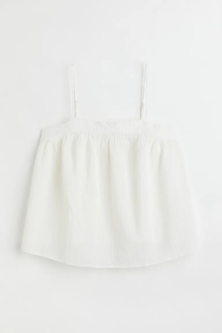 Short top in woven, crinkled cotton fabric with a narrow cut at top. Extra-narrow, adjustable sho... | H&M (US + CA)