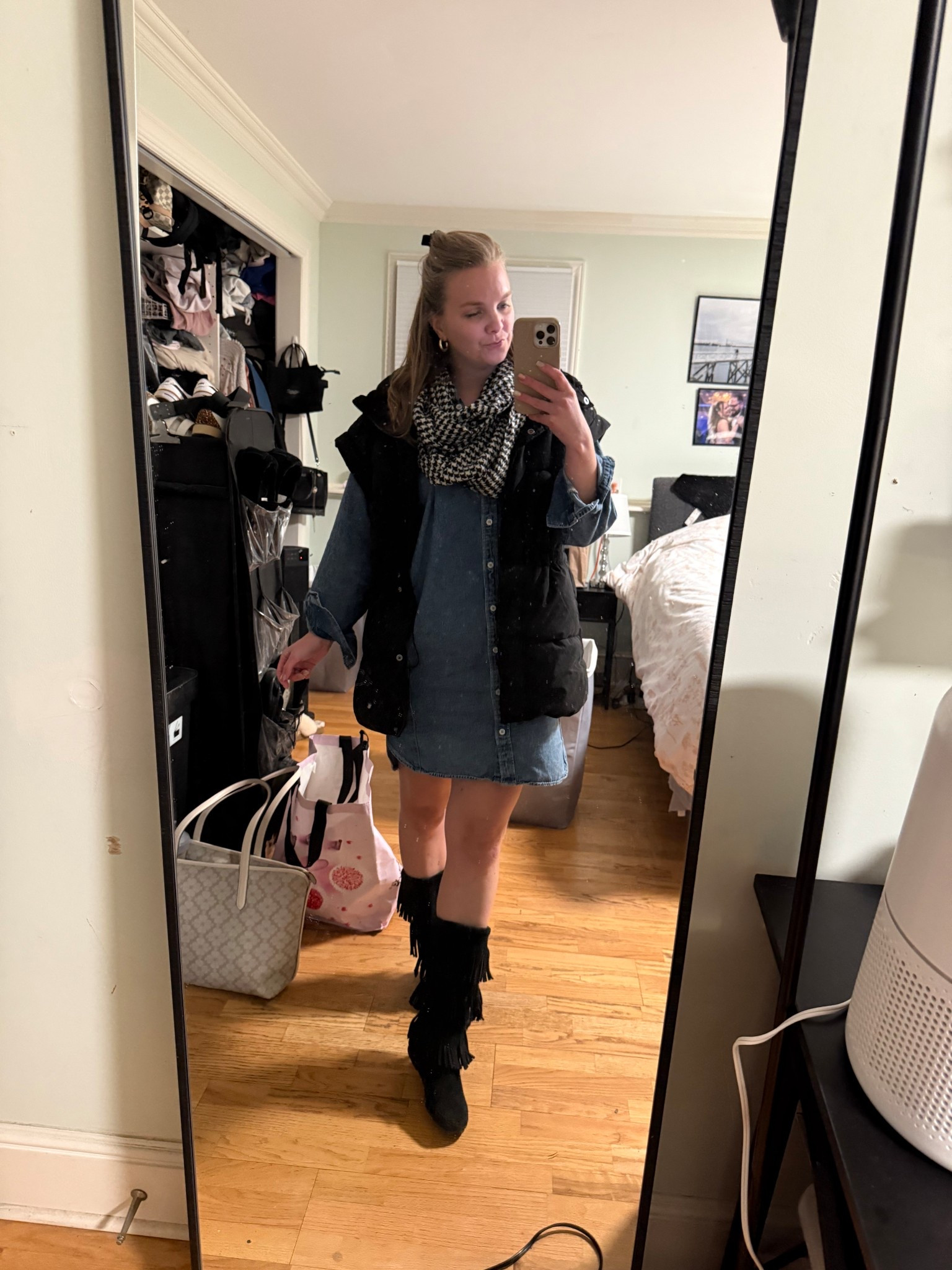 Denim dress outfit paired with an infinity scarf, fringe boots and a puffer vest 



#LTKootd #LTKWorkwear #LTKFindsUnder50