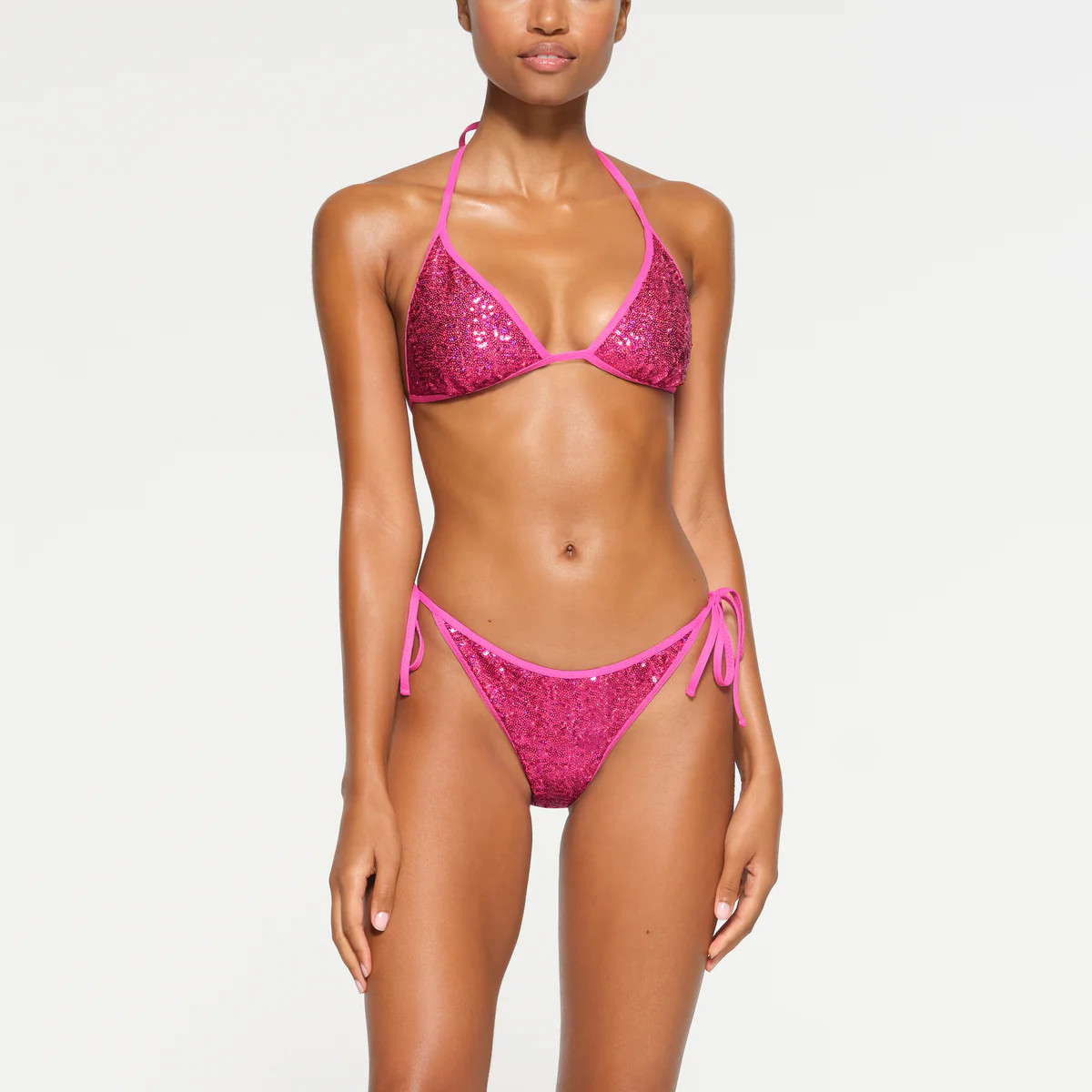 SEQUIN TRIANGLE BIKINI TOP | FLAMINGO | SKIMS (US)