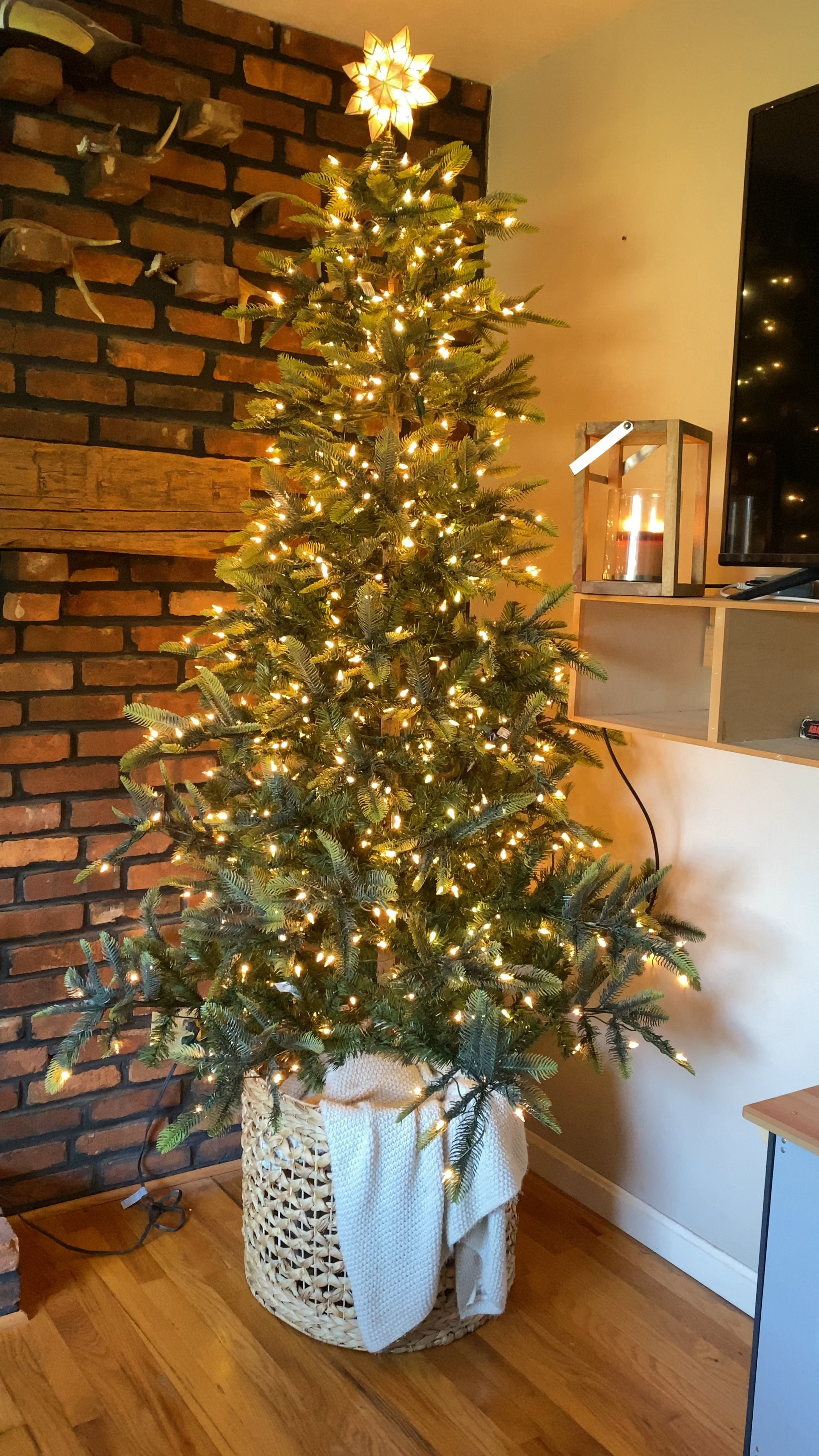 Added some twinkle lights to our Christmas tree and it might be the best decision ever 🤩 

Christmas tree // prelit tree // artificial tree // minimalist tree //  Christmas decor // Christmas lights // twinkle lights // Christmas tree basket // living room Christmas // realistic tree 

#LTKhome #LTKHoliday #LTKSeasonal